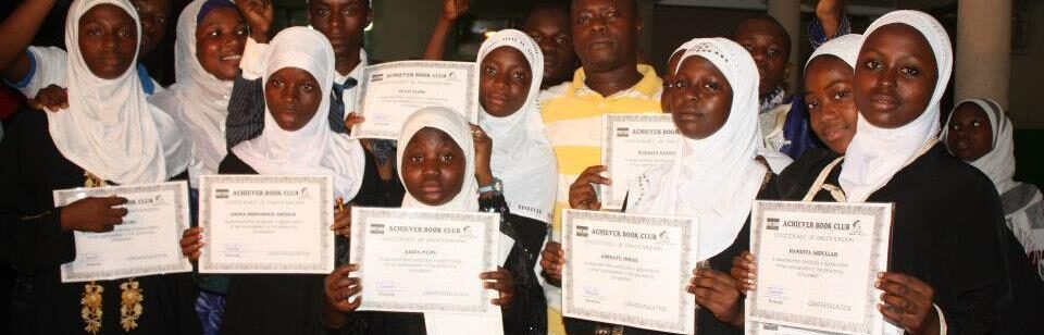 Historic photo of Achievers Ghana students during a reading club session